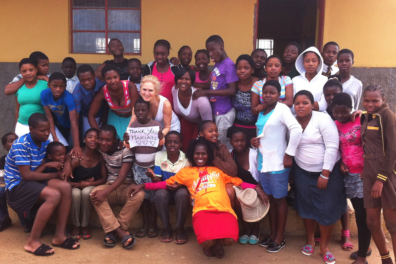 Christine teaching a group of students in South Africa
